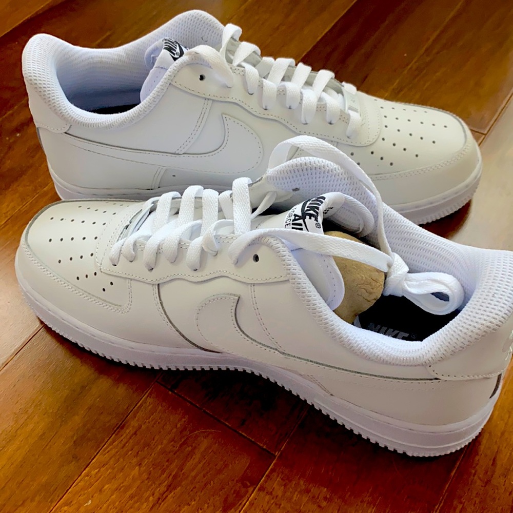 All white Nike Air Force 1s